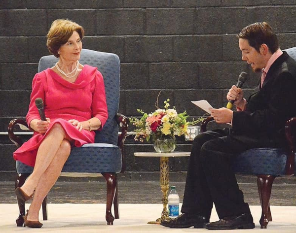 Former First Lady Laura Bush speaks with Marshfield, Missouri’s Cherry Blossom Festival Founder Nicholas Inman during an appearance in 2014. (Photo: Missouri Cherry Blossom Festival)
